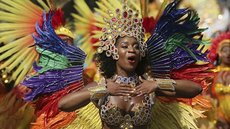 Costumed revellers perform in the Notting Hill Carnival in London, Monday, Aug. 28, 2017