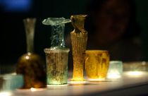 The newly conserved ancient glass vessels damaged during the 2020 Beirut port explosion  displayed at the British Museum in London