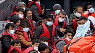 People thought to be migrants are brought in to Dover, Kent, England, following a small boat incident in the Channel, Monday July 11, 2022