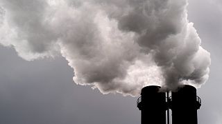Smoke rises from a chimney of a Vattenfall heating power plant in Berlin, Germany, Tuesday, May 4, 2021