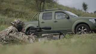 Ukrainian sniper Andriy attends a training outside of Kyiv, 27 August 2022