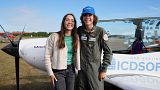Seventeen year old Anglo-Belgian pilot, Mack Rutherford, right, poses with his sister Zara Rutherford after landing at the Buzet airfield in Pont-A-Celles, Belgium.