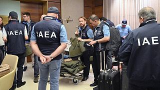 Inspetores da AIEA em Viena antes de embarcarem em direção a Kiev