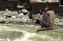 Flood victims walk for hours due to destroyed infrastructure in Pakistan