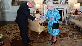 Britain's Queen Elizabeth II welcomes newly elected leader of the Conservative party Boris Johnson during an audience at Buckingham Palace, London, Wednesday July 24, 2019