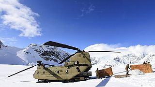 Military helicopter on mountain