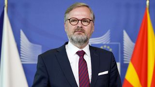 Czech Republic's Prime Minister Petr Fiala speaks to the media at the EU headquarters in Brussels.