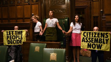 Climate activists glued themselves together around the Speaker's Chair in UK parliament