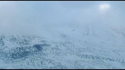 The snowy terrain of Klyuchevskaya Sopka Volcano, the highest in Eurasia 