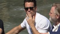 Colin Farrell blows kisses to fans along gondalo in Venice, Italy