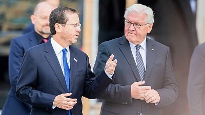 Israeli President Isaac Herzog, left, and German President Frank-Walter Steinmeier, right.