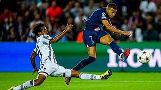 Kylian Mbappe became the youngest player to score 35 goals in the Champions League after he netted twice in Paris Saint-Germain's 2-1 win over Juventus.