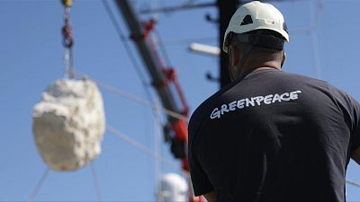 Greenpeace dropped boulders weighing between 500 and 1,400 kilograms into the Channel.