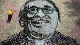 Colombian artist recreates Garcia Marquez's face with recycled glass bottles