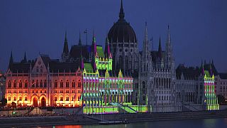 The Parliament building illuminated in Budapest. Many will face higher bills after the government decided to scrap expensive price caps for some households