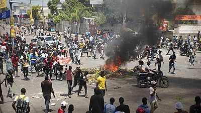   مظاهرة للمطالبة بتنحي رئيس الوزراء الهايتي أرييل هنري في هايتي، 7 سبتمبر 2022.