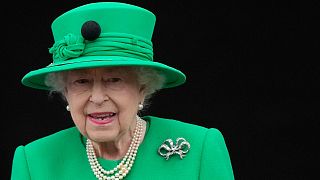 Queen Elizabeth II stands on the balcony during the Platinum Jubilee Pageant at the Buckingham Palace in London, Sunday, June 5, 2022