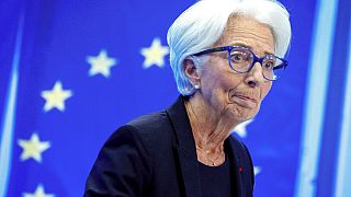 Christine Lagarde, President of the ECB smiles during a press conference following a meeting of the governing council in Frankfurt, Germany, Thursday, July 21, 2022. 