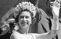 Queen Elizabeth II waves to children at a party in Ottawa's Lansdowne Park in 1967