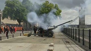 Ninety-six cannon salutes rang out next to tower bridge in London to honour the Queen.