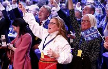 Supporters of the Sweden Democrats reacts on the results of the exit polls at the party's election watch near Stockholm, 11 September 2022