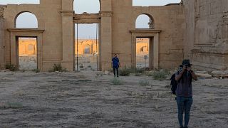 Tourists visit the ancient city of Hatra in northern Iraq on September 10, 2022