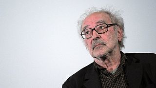 Swiss film director Jean-Luc Godard attends a debate when presenting his last movie 'Film socialiste' (Socialist movie) at the Cinema des cineastes in Paris, on June 18, 2010.