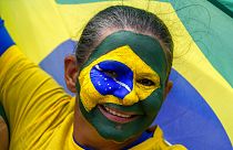 A supporter of Brazil's President Jair Bolsonaro attends a military parade commemorating the bicentennial of the country's independence in Brasilia, Brazil, 7 Sept., 2022.