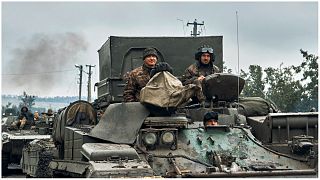 المركبات العسكرية الأوكرانية على الطريق في المنطقة المحررة في خاركيف بأوكرانيا، 12 سبتمبر 2022.
