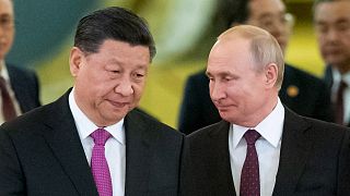 FILE - Chinese President Xi Jinping, left, and Russian President Vladimir Putin