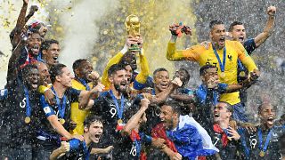 The French squad celebrate after winning the 2018 World Cup