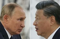 A combination photo shows Russian President Vladimir Putin and China's President Xi Jinping during their meeting in Samarkand