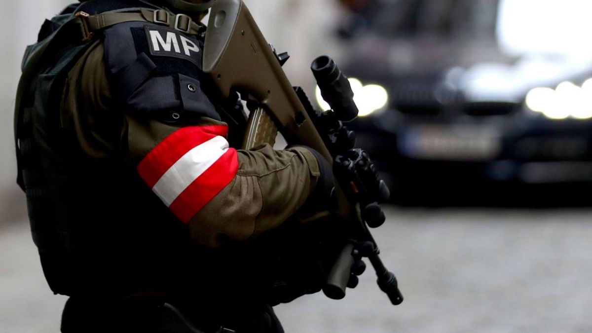A military police officer stands guard in Vienna.