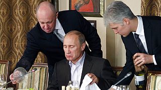 Putin y el empresario Yegueni Prigozhin, a la izquierda