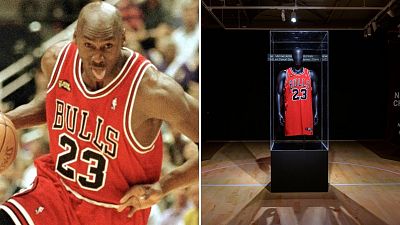 Jordan's iconic red Chicago Bulls jersey sells for a slam dunk price 