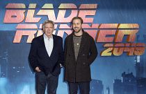 Harrison Ford, left, and Ryan Gosling pose for photographers during the photo call for 'Blade Runner 2049' in London, Thursday, Sept. 21, 2017
