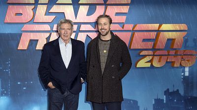 Harrison Ford, left, and Ryan Gosling pose for photographers during the photo call for 'Blade Runner 2049' in London, Thursday, Sept. 21, 2017