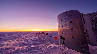 The Sun dawns over the NOAA facilities in the South Pole where a hole in the ozone layer opens up every year. 