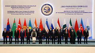 Leaders at the 2022 Shanghai Cooperation Organisation summit stand for a group photo