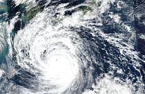 This Saturday, Sept. 17, 2022 satellite image released by NASA shows Typhoon Nanmadol, which is approaching southwest Japan.