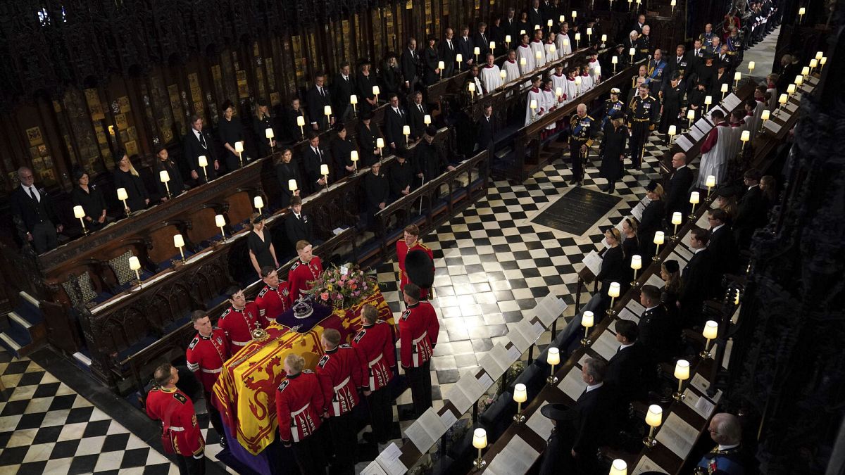The coffin of Queen Elizabeth II is carried in by the Bearer Party during the Committal Service held in St George's Chapel, Windsor Castle. Monday, 19 September 2022.