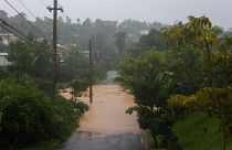 Una carretera se inunda por las lluvias del huracán Fiona en Cayey, Puerto Rico, el domingo 18 de septiembre de 2022.