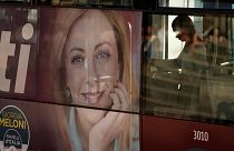 A poster of Italy's candidate premier Giorgia Meloni stands on the side of a bus in Rome, Friday, 16 September 2022.