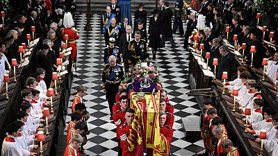 The coffin of Queen Elizabeth II is carried out of Westminster Abbey. Monday, 19 September 2022.