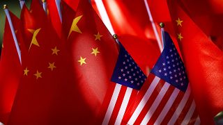 أعلام صينية وأمريكية من لقاء بين الطرفين في 2016