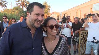  Salvini poses with a supporter on his campaign trail on the Italian island of Lampedusa