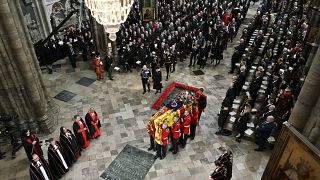 King Charles III, Camilla, the Queen Consort and other members of the Royal family follow behind the coffin of Queen Elizabeth II