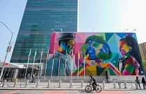 A mural by Brazilian artist Eduardo Kobra, focusing attention on climate change is displayed outside the United Nations headquarters in New York.
