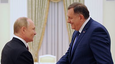 Russian President Vladimir Putin and Bosnian Serb leader Milorad Dodik shake hands during a meeting in the Kremlin on Tuesday, 20 September 2022