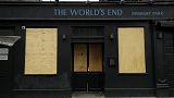 The World's End pub, which is a traditional place name for a boundary or the edge of an urban area, stands temporarily closed with boarded up windows due to Covid, 2020.  